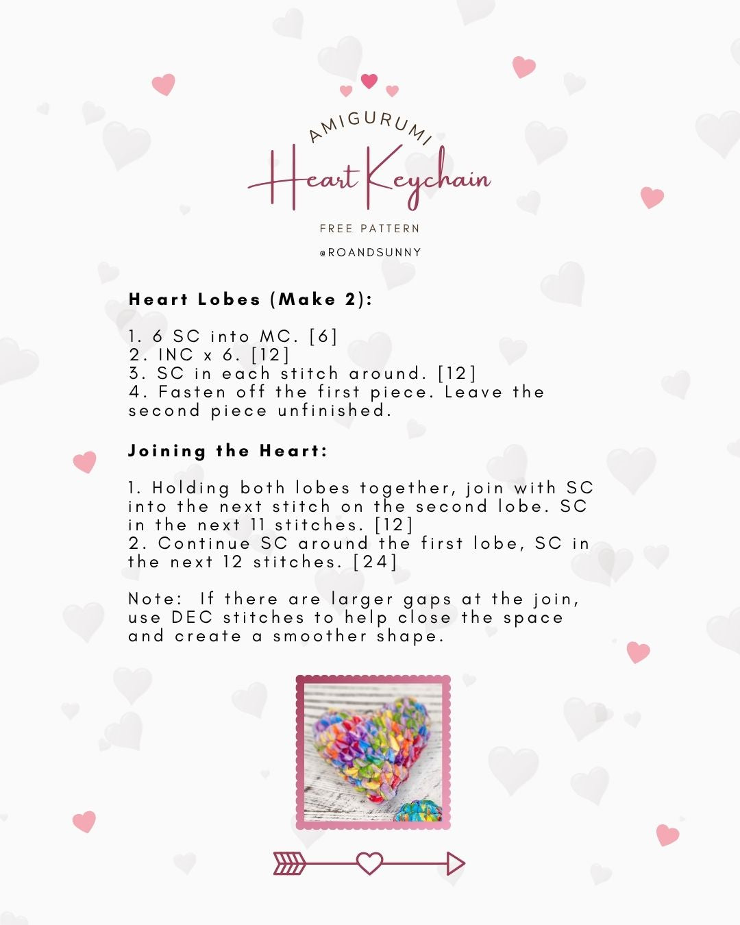 Amigurumi heart keychain free pattern with text and colorful heart illustration on a white background.