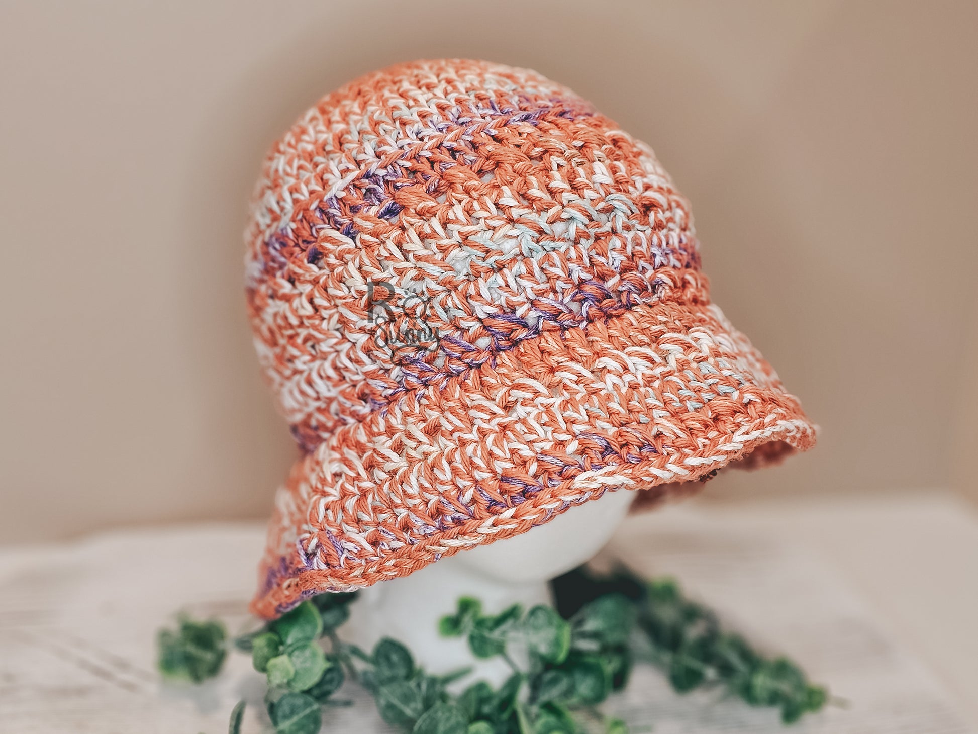Bucket Hat in the color Sienna - Dark Orange Base with highlights of White, Green, Purple.