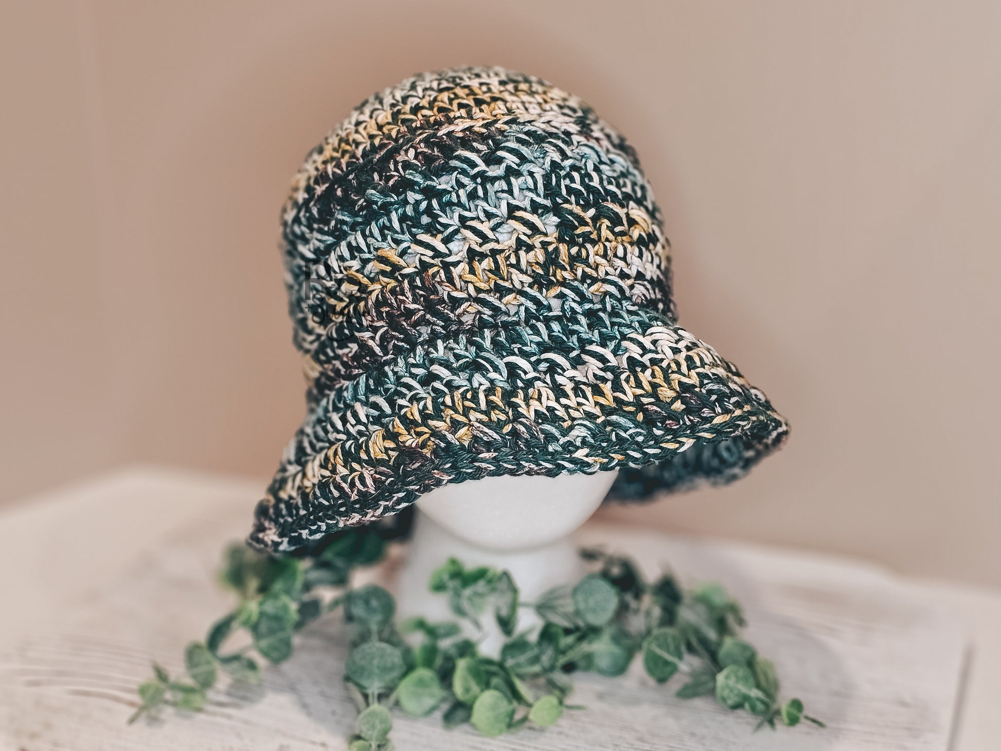 Bucket Hat in color Willamette Valley -  Dark Green Base with highlights of Yellow, White, Brown.
